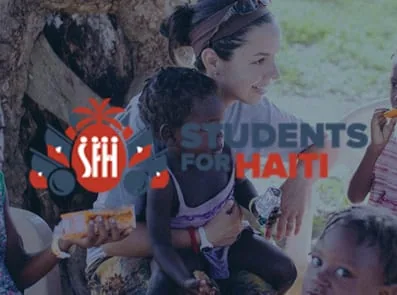 Students for Haiti logo over volunteer and children in Haiti